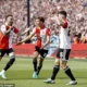 Feyenoord edged closer to the title with a second-half win over Ajax in a wild classic