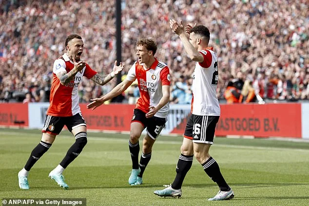 Feyenoord edged closer to the title with a second-half win over Ajax in a wild classic